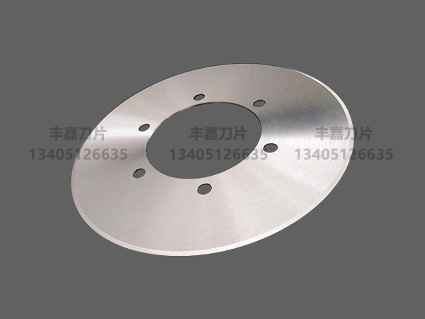 Corrugated slitting blade