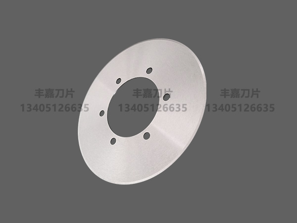 Corrugated slitting blade